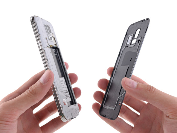 Repair a Cracked Samsung Galaxy S5 Screen Peel the battery door off this GS5