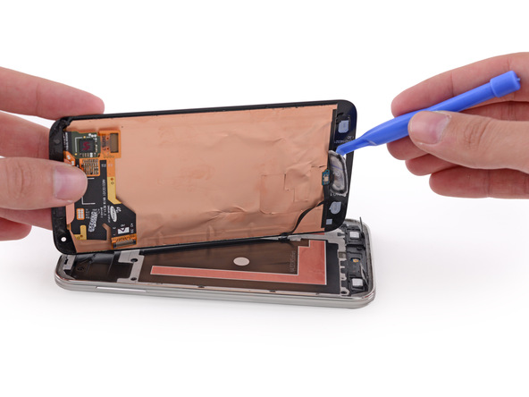How to Fix a Cracked Galaxy S5 Display Pry the Galaxy S5 home button off the glass