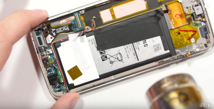 Heat up to the adhesive underneath the battery-14.jpg