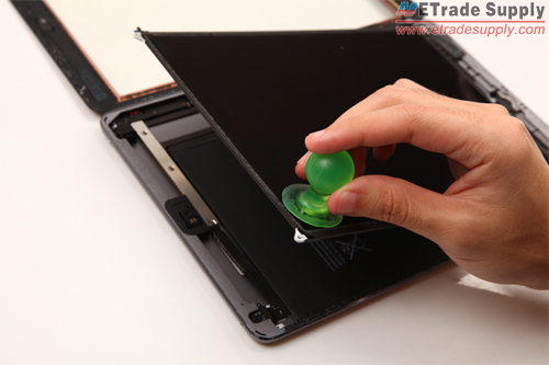 Use suction cup to pull the LCD up gently