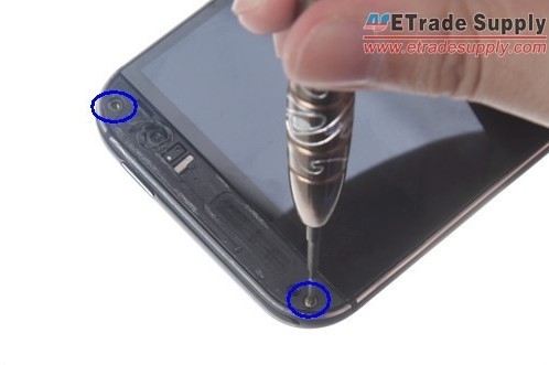 https://www.etradesupply.com/blog/wp-content/uploads/2014/05/Unscrew-two-screws-of-HTC-One-M8-top-cover.jpg