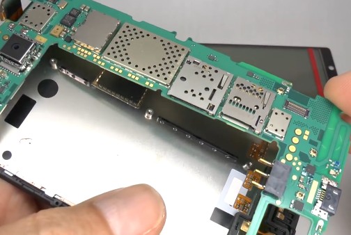 9Remove the mainboard away