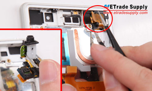 Pry up the connector and take out the earphone jack module