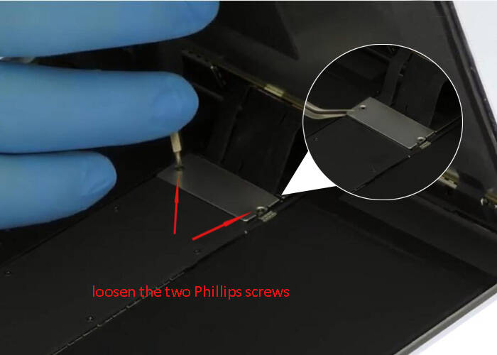 loosen the two phillips screws and remove the bracket