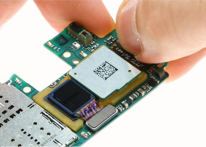 Install the new rear facing camera into the mainboard