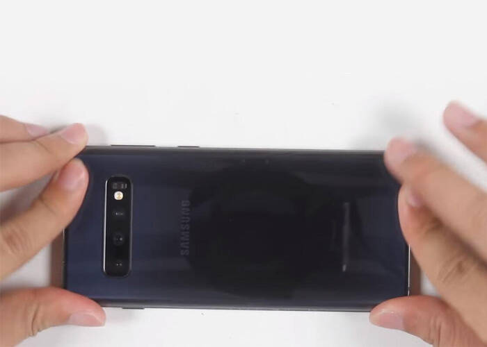 Cover the battery door and seal up the phone