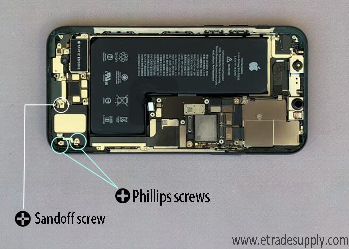 remove the two Phillips screws and a standoff screw