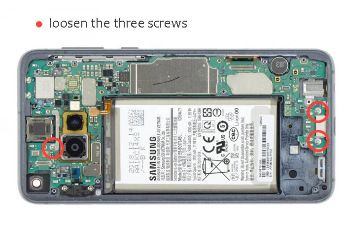 loosen the three screws on the mainboard