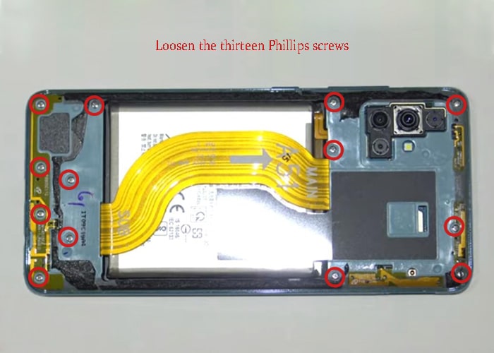 loosen the 13 screws from the middle frame