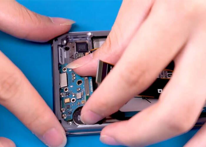 install the new charging port PCB board to the phone