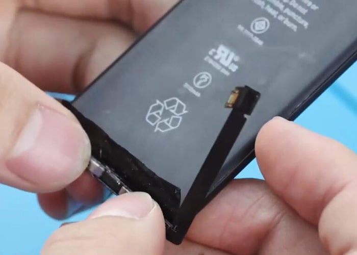 paste the battery tape and activate the battery