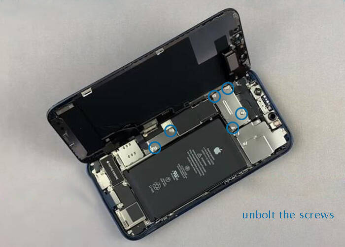 Unbolt the screws for fixing the display flex cable