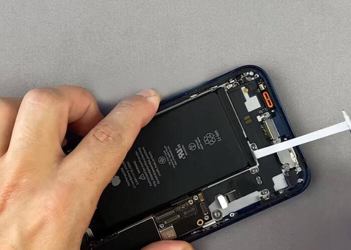 Tear off the battery adhesive sticker