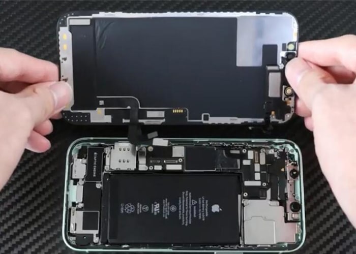 Disconnect the ear speaker flex and separate the iPhone 12 screen